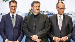 Wüst, Söder und Merz