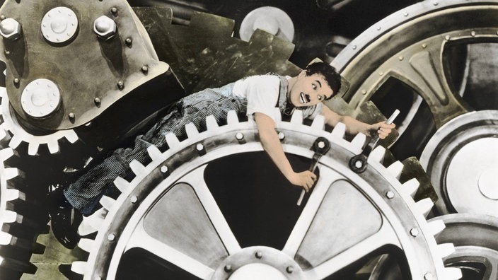 Modern Times (1936), scena kada Charlie Chaplin zavrće šrafove na ogromnim zupčanicima