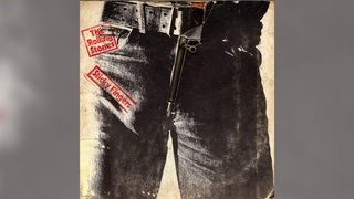 Plattencover: "Sticky Fingers" von den Rolling Stones - Eine schwarze Hose mit großem, leicht geöffneten Reißverschluss