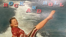 Rock And Roll Featuring Louis Prima.