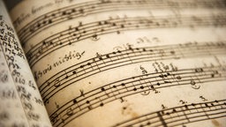 Das Beitragsbild der WDR3 Vesper "Eine mehrstimmige Messe & Drucker – Verleger – Komponist" zeigt ein Notenblatt des Komponisten Georg Philipp Telemann (1681-1767)