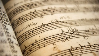 Das Beitragsbild der WDR3 Vesper "Eine mehrstimmige Messe & Drucker – Verleger – Komponist" zeigt ein Notenblatt des Komponisten Georg Philipp Telemann (1681-1767)