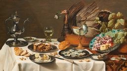 Das Beitragsbild der WDR3 Vesper Spezial "Genussvoll!" zeigt ein Stillleben mit Truthahnpastete, Öl auf Holz von Pieter Claesz aus dem Jahr 1627.