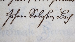 Das Beitragsbild der WDR3 Vesper "Bach und die Ciacona & Bach und Brahms" zeigt die Unterschrift von Johann Sebastian Bach
