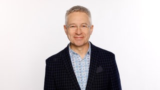 Moderator Thomas Mau