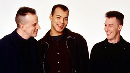 Die Mitglieder der Band Fine Young Cannibals in den 80ern