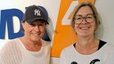 Peter Schilling und Ute Schneider vor der WDR 4 Logo-Wand