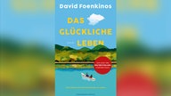 Buchcover: "Das glückliche Leben" von David Foenkinos. Unten ist ein See zu sehen, darauf ein kleines Ruderboot mit zwei Personen. Der Himmel darüber ist strahlend blau, darauf ist der Titel in leuchtend gelber Schrift zu sehen.