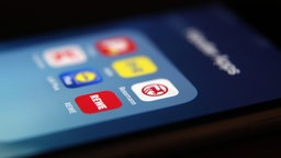 Apps von Handelsketten auf dem Display eines Smartphones