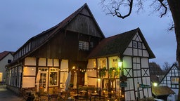 Fachwerkhaus in einer Gasse am Premium Stadtwanderungsweg "Tecklenburger Romantik"