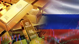 Goldbarren gestapelt auf der russischen Flagge, 22.10.2025.