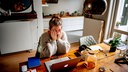 working from home burnout anxiety stress a woman is looking for a job and has her hands in her hair