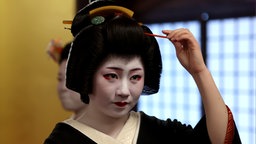 Eine junge Geisha in Japan