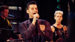 Die Band Depeche Mode während eines Auftritts auf der Bühne. 