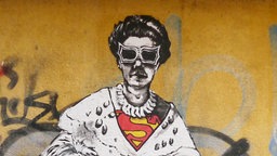 Gemälde auf einer Häuserwand von Peggy Guggenheim 