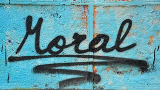 Graffiti mit dem Wort Moral