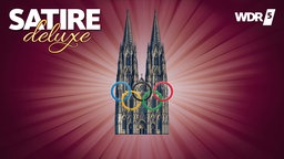 Kölner Dom mit den olympischen Ringen