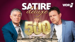 Axel Naumer und Henning Bornemann halten eine goldene 500 in der Hand