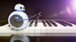 3D-Computergrafik: Ein kleiner runder Roboter rollt über eine Klaviertastatur