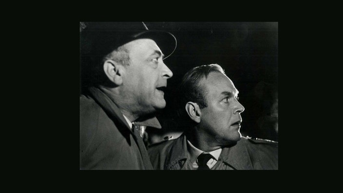 Karl Georg Saebisch (li.) und Herbert Tiede (re.) in "Der Richter und sein Henker" (1957)