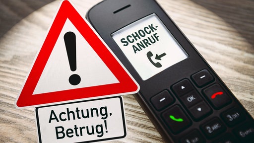 Telefon mit der Aufschrift "Schock-Anruf", daneben ein auffälliges Warndreieck "Achtung, Betrug!"