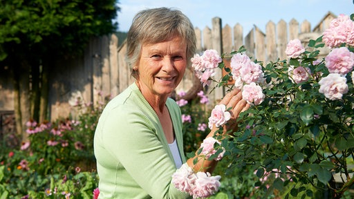 Magdalene mit rosa Rosen 