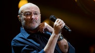 Phil Collins steht 2018 bei einem Auftritt in Mexiko auf der Bühne