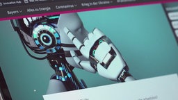 Ein Roboter der sich an die Stirn fasst