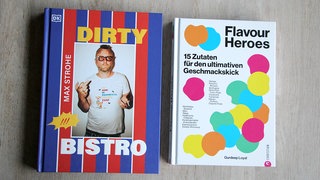 Kochbücher "Dirty Bistro" von Max Strohe und "Flavour Heroes" von Gurdeep Loyal